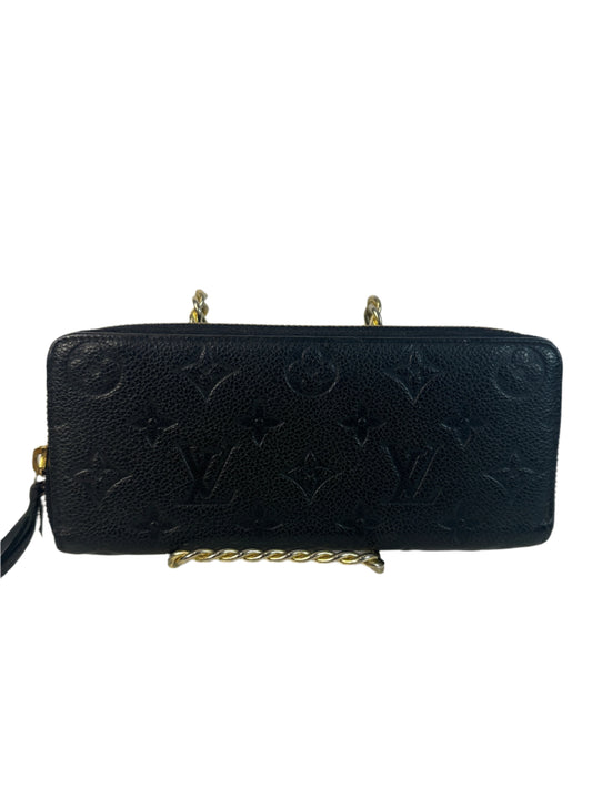 Pre-owned LOUIS VUITTON Clemence wallet in black leather with zipper
