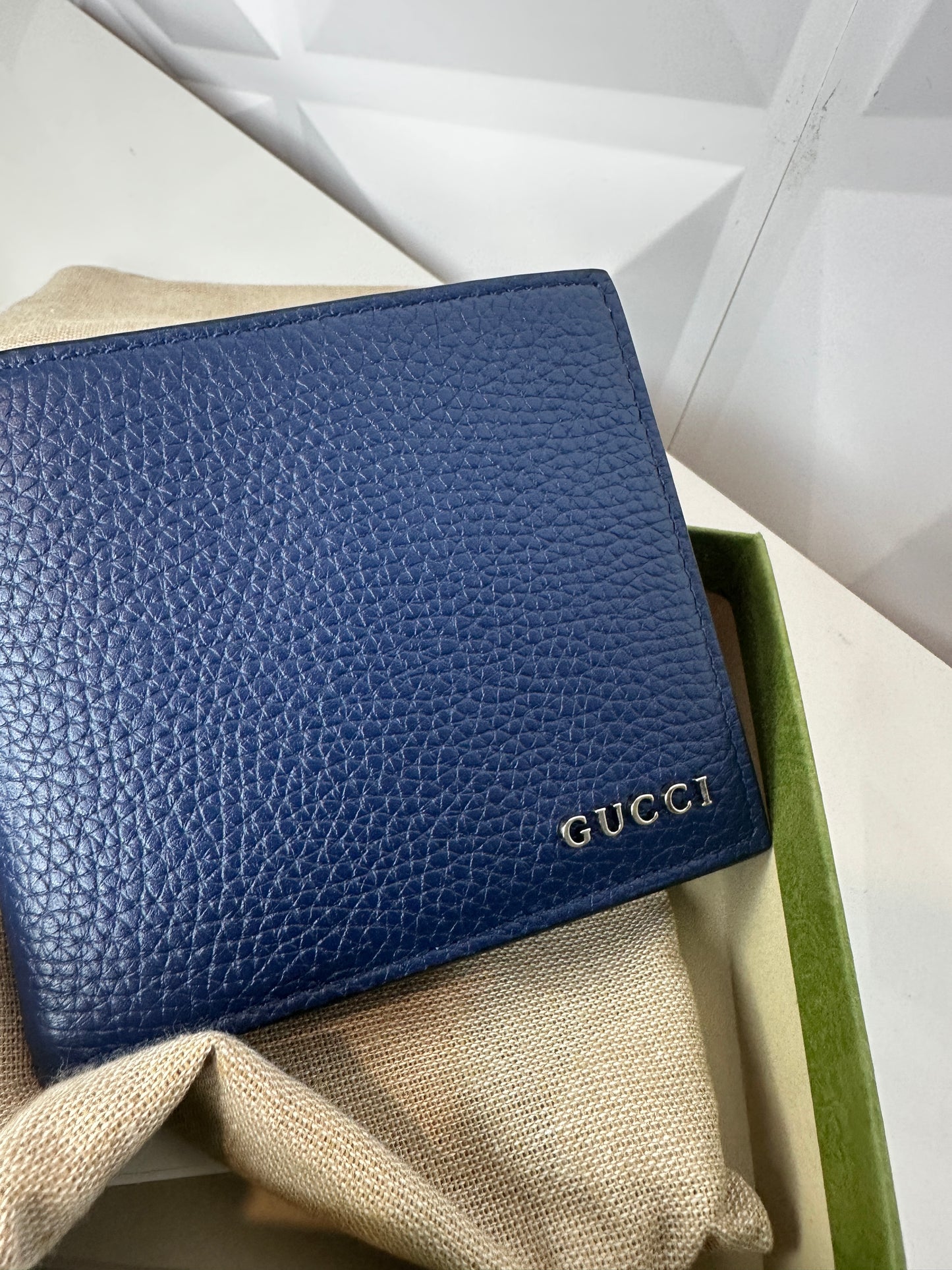 Pre-owned GUCCI blue wallet with box